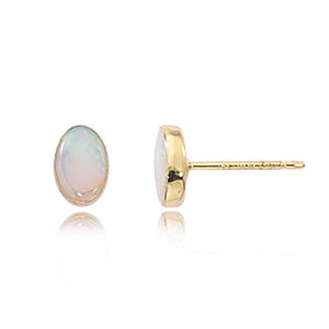 14 karat yellow gold small opal bezel set stud earrings
