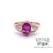 Revolving video of 18 karat rose gold natural pink sapphire and diamond ring