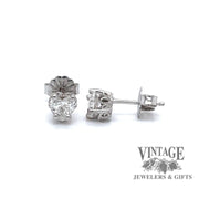 Revolving video of 14 karat white gold .50ctw Heart shape diamond stud earrings