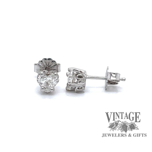 Revolving video of 14 karat white gold .50ctw Heart shape diamond stud earrings