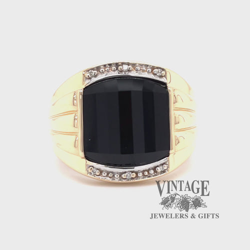 Revolving video of 14 karat yellow gold faceted onyx and diamond tapered ring