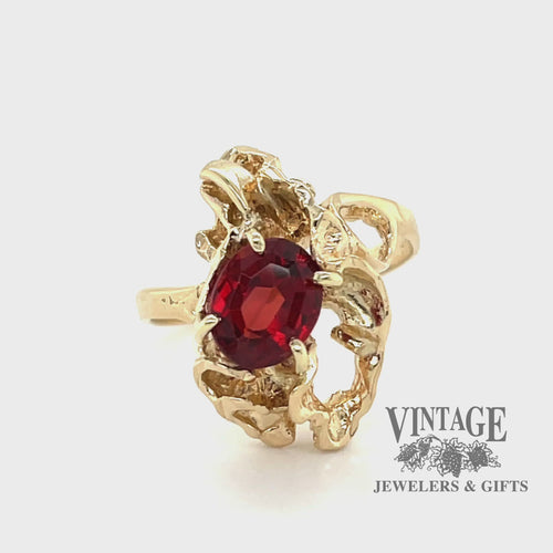 Revolving video of 14 karat yellow gold 1.70ct oval garnet freeform ring