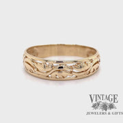 Revolving video of 14 karat yellow gold openwork "vines" design ring