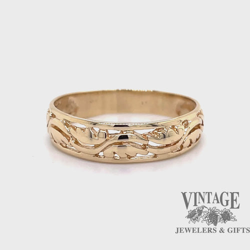 Revolving video of 14 karat yellow gold openwork "vines" design ring