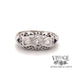 Revolving video of 18 karat white gold vintage filigree diamond and sapphire ring