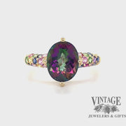 Revolving video of 14 karat yellow gold mystic topaz multi color pave ring