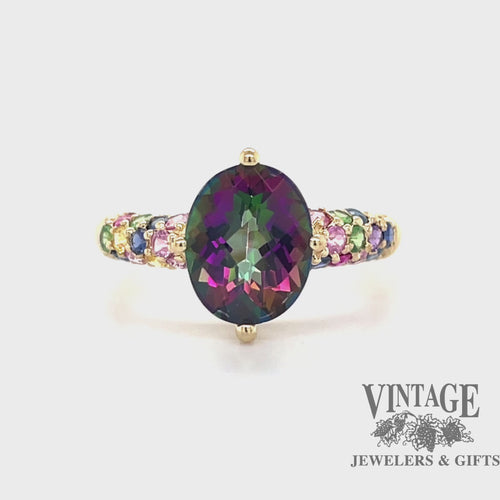 Revolving video of 14 karat yellow gold mystic topaz multi color pave ring