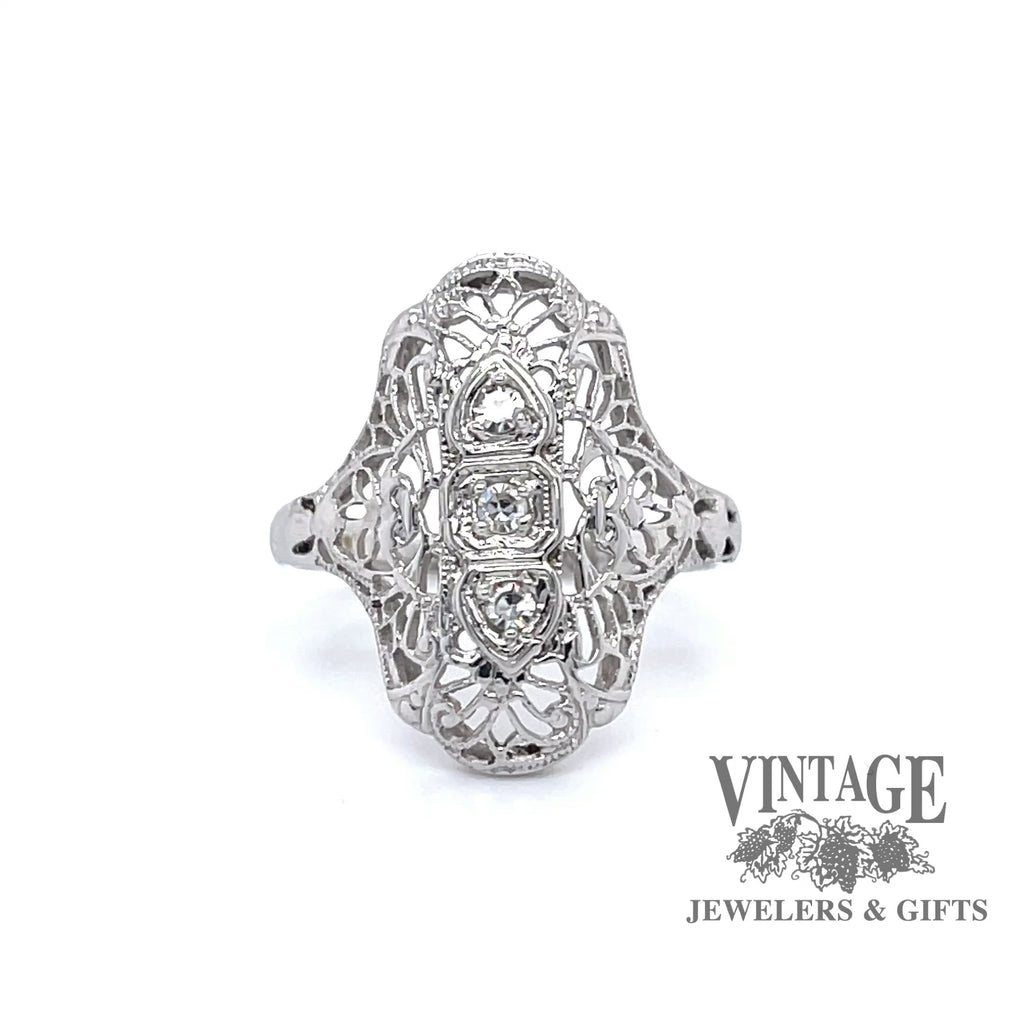 Revolving video of Vintage filigree 18k white gold and diamond ring