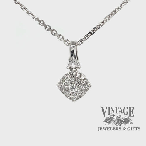 Revolving video of 14 karat white gold cushion shaped diamond pendant