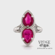 Revolving video of 14 karat white gold 2.8 carat total weight ruby vintage filigree ring