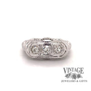 Revolving video of Vintage filigree .45 carat total weight 3 diamond 18k white gold band