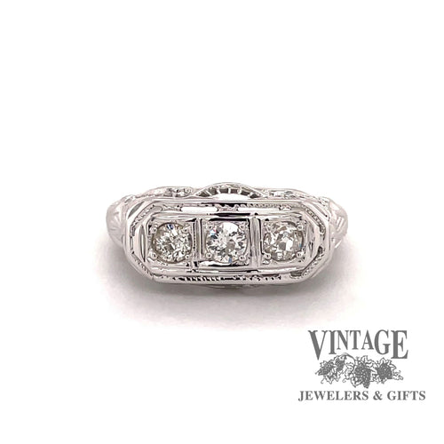 Revolving video of Vintage filigree .45 carat total weight 3 diamond 18k white gold band