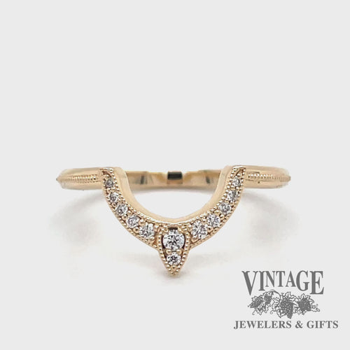 Revolving video of 14 karat yellow gold fitted diamond wedding band