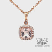 Revolving video of 14 karat rose gold 1.09ct Morganite and diamond halo pendant
