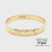 14 karat yellow gold floral solid bangle bracelet