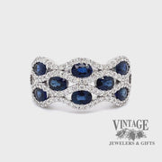 Revolving video of 14 karat white gold Blue sapphire and diamond band ring