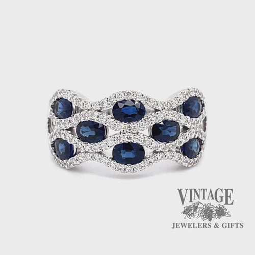 Revolving video of 14 karat white gold Blue sapphire and diamond band ring