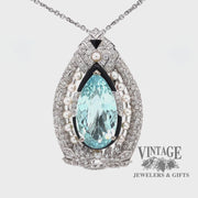 Video of 18 karat white gold Art Deco Aquamarine, diamond and pearl pendant/pin