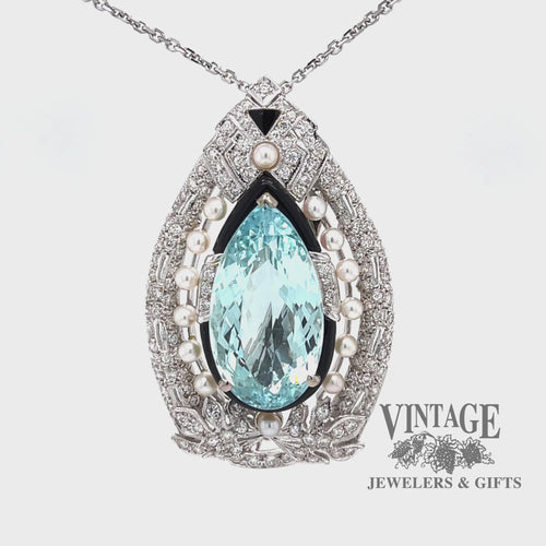 Video of 18 karat white gold Art Deco Aquamarine, diamond and pearl pendant/pin