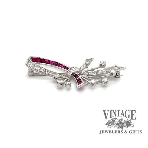 Revolving video of Vintage platinum ruby diamond bow design pin
