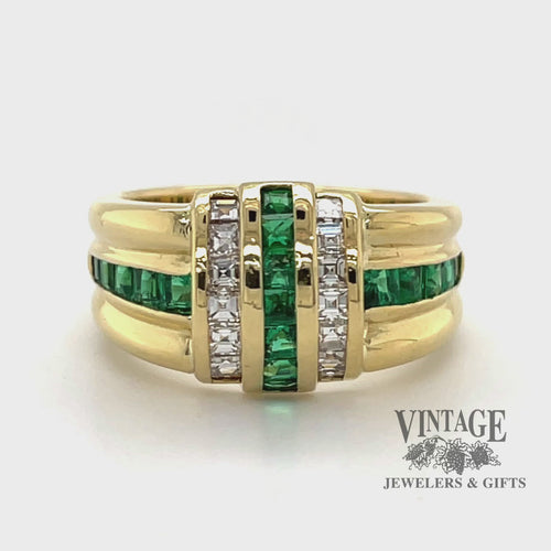 Revolving video of 18 karat yellow gold emerald and diamond channel set band ring