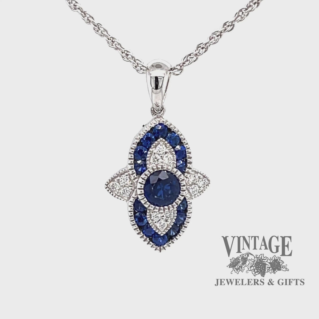 Revolving video of 14 karat white gold natural blue sapphire and diamond necklace