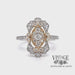 Revolving video of 14 karat two tone .50ct vintage inspired diamond cluster ring