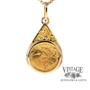 Revolving video of 14 karat yellow gold estate state of Alaska 1/10 oz commemorative coin pendant