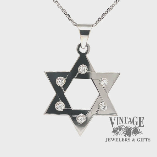 Revolving video of 14 karat white gold Star of David pendant with diamonds