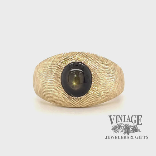 Video of 14 karat yellow gold Black star sapphire florentine ring