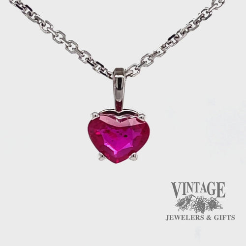 Revolving video of 14 karat white gold 1.15ct heart shape natural ruby pendant
