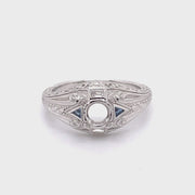 Revolving video of  14 karat white gold diamond and sapphire semi mount ring