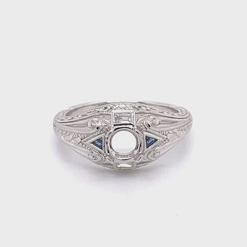 Revolving video of  14 karat white gold diamond and sapphire semi mount ring