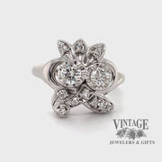 Revolving video of 14 karat white gold .48ctw diamond Bouquet shaped ring