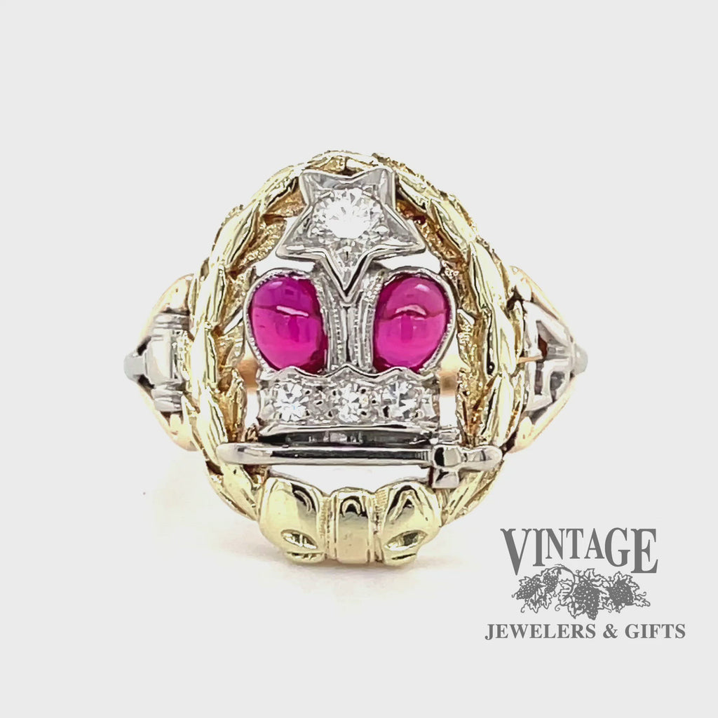 Revolving video of 14 karat two-tone gold Ruby and diamond Eastern Star ring