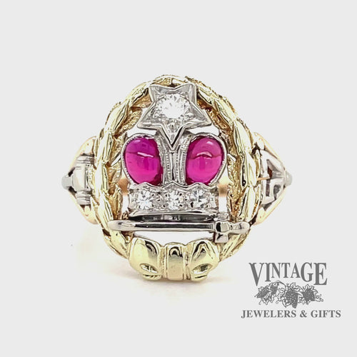 Revolving video of 14 karat two-tone gold Ruby and diamond Eastern Star ring