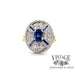 Two tone estate sapphire and diamond ring