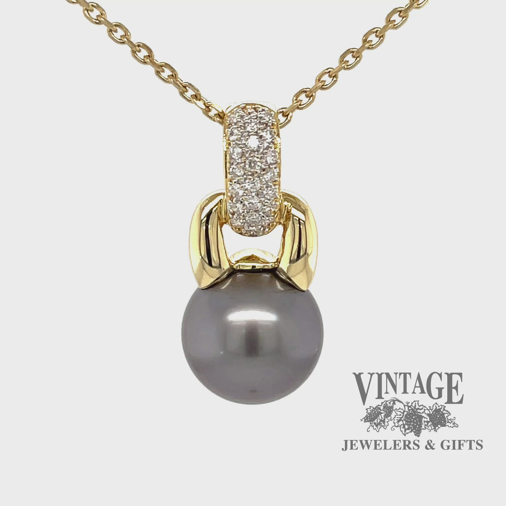Revolving video of 18 karat yellow gold Tahitian pearl enhancer pendant with pave' set diamonds