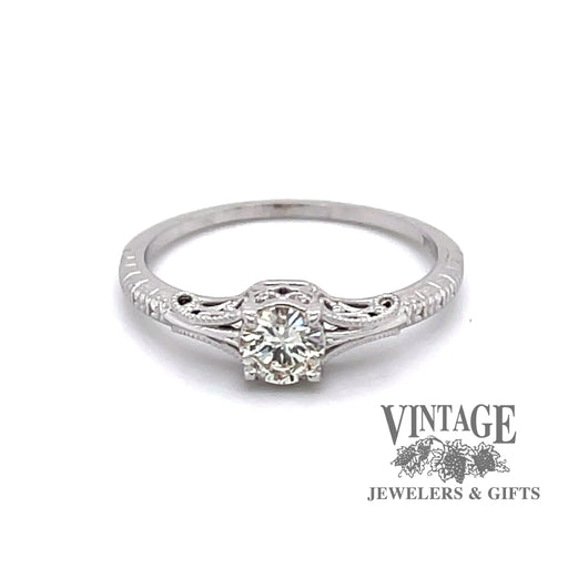 Revolving video of Edwardian inspired solitaire ring design set with a sparkling .36 carat round H color, VS1 clarity, natural diamond in 14 karat white gold