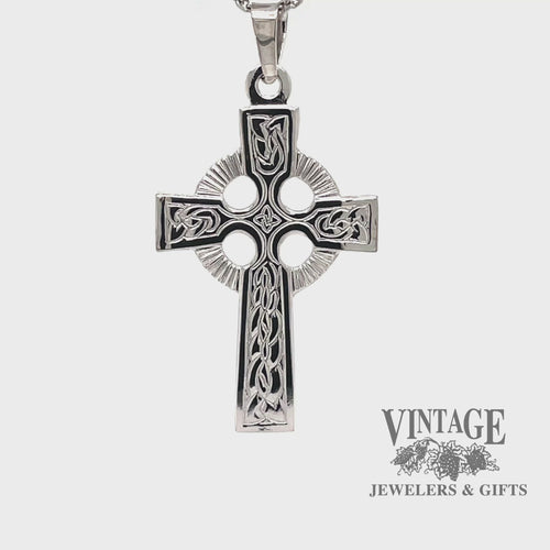 Revolving video of 14k white gold Celtic cross pendant.