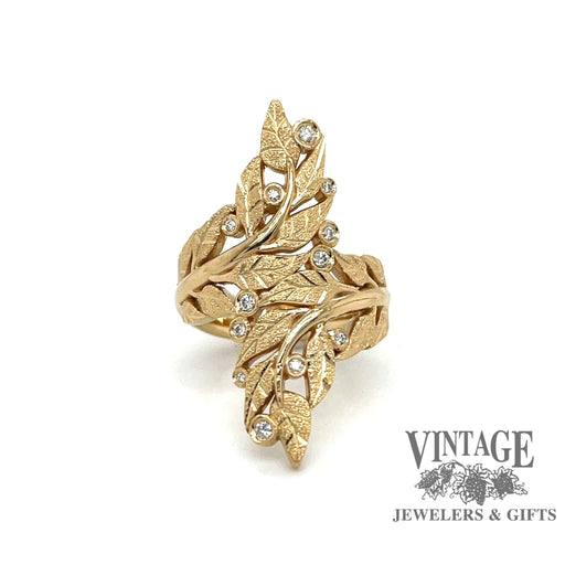 Revolving video of Leaf motif and diamond 18k gold bypass ring