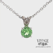 Revolving video of 14 karat white gold 1.04 carat round tsavorite pendant