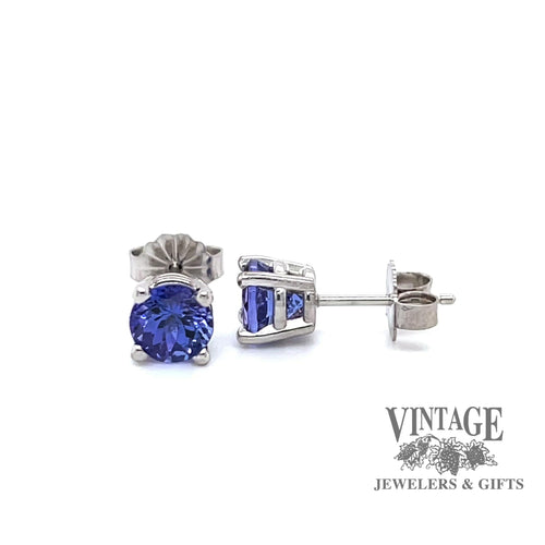 Revolving video of 14 karat white gold 5.5 mm round tanzanite stud earrings