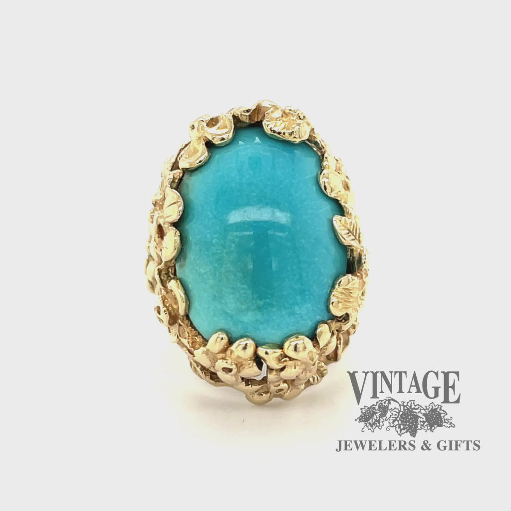 Revolving video of 14 karat yellow gold floral design turquoise ring