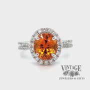 Revolving video of 18 karat white gold 3.56 carat mandarin garnet and diamond ring