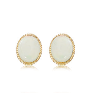 14  karat yellow gold opal bezel set twist rim pierced stud earrings