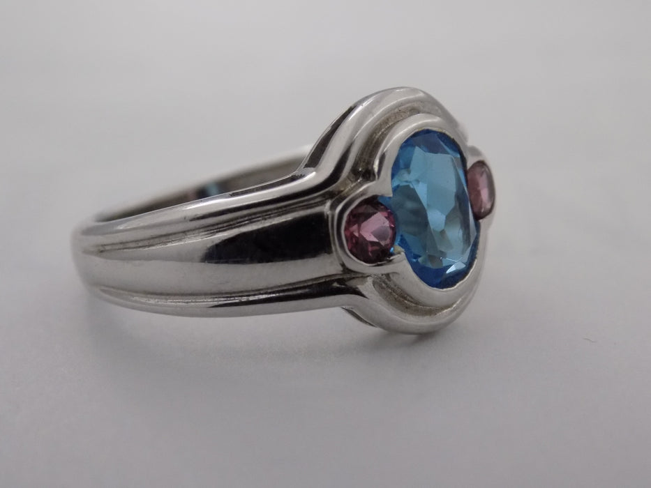 Oval blue topaz, pink tourmaline white gold ring
