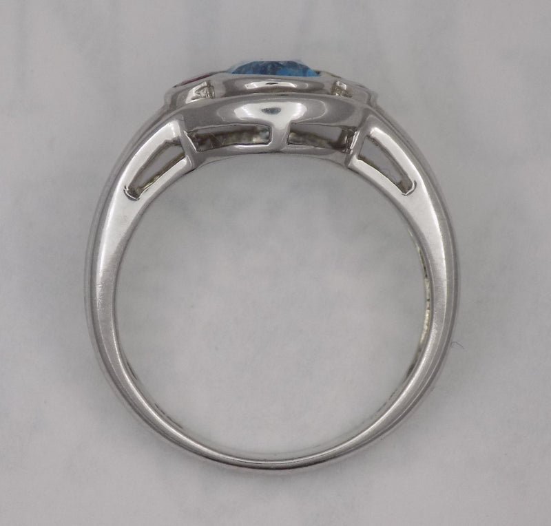Oval blue topaz, pink tourmaline white gold ring