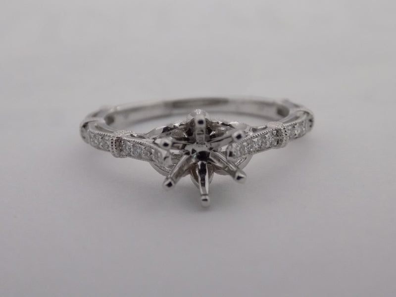 Diamond ribbon motif semi-mount engagement ring