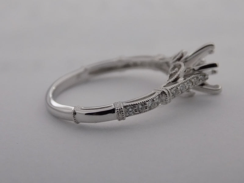 Diamond ribbon motif semi-mount engagement ring